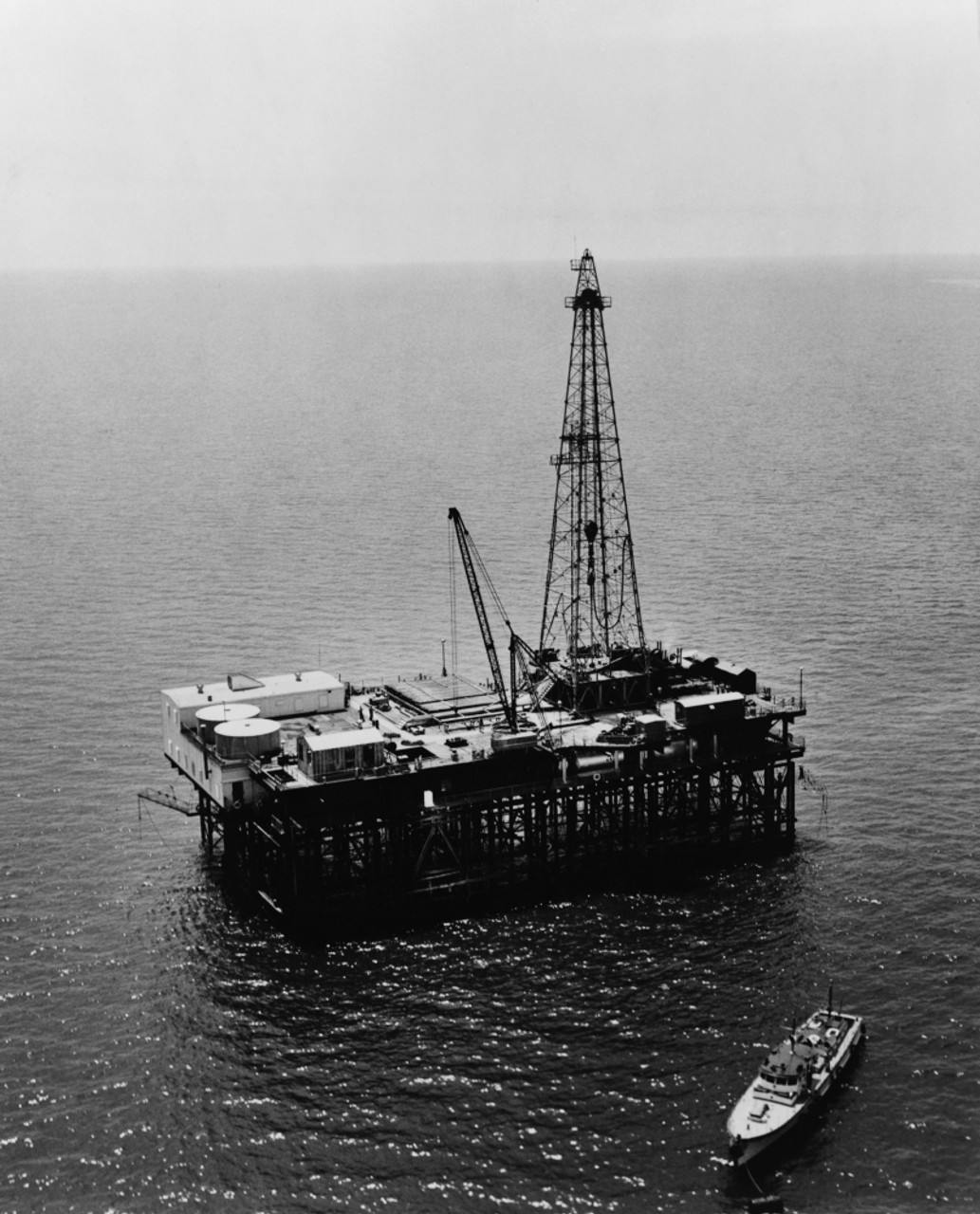 Sons, Robert (machinist) and Clyde Jr. (welder), join the company. Secured first offshore contract with Humble Oil, later purchased by Exxon. 
